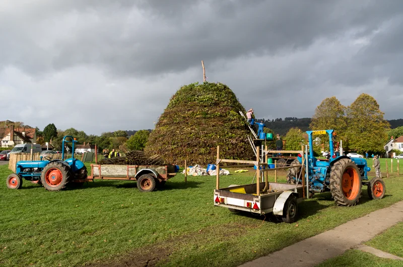 Volunteers building the bonfire on Brockham Green, the heart of the evening